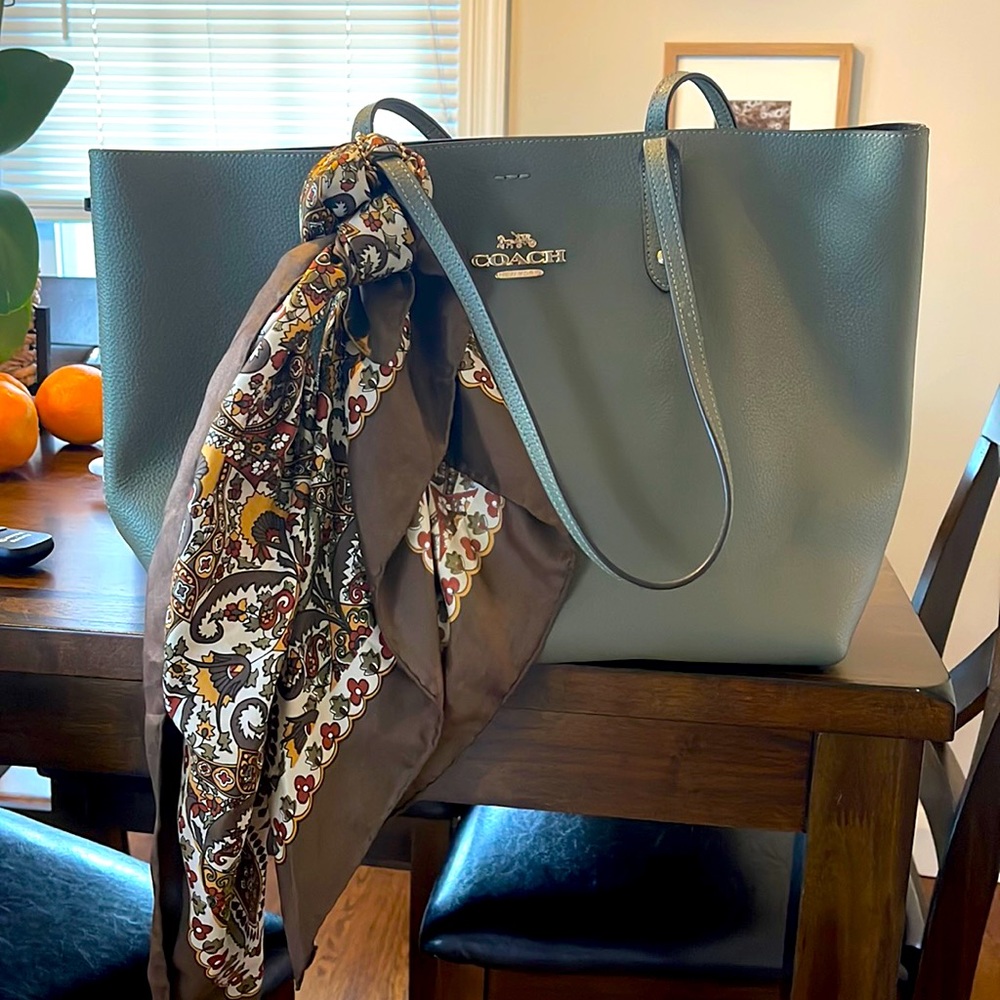 Brand new never used coach tote. Perfect for travel, laptops, and everyday use.